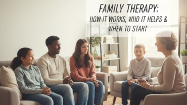 A family sitting together in a living room during a family therapy session with a licensed therapist.